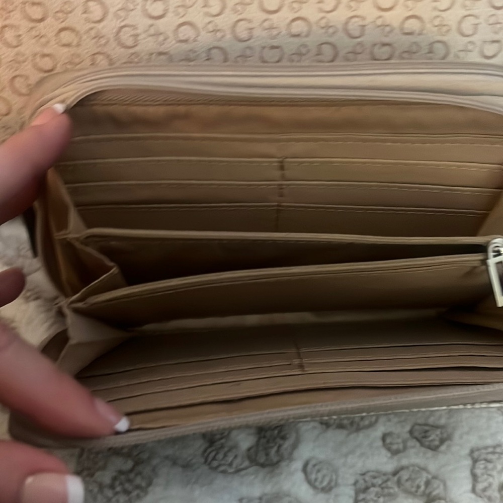 Womens Guess wallet . This wallet is in excellent condition.
